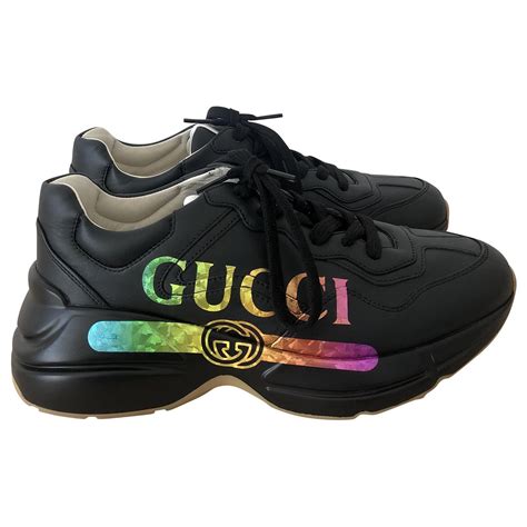 gucci rhyton sneakers logo
